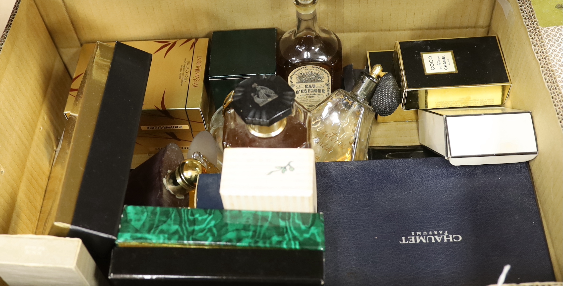 An assorted collection of mixed perfumes (some used): Lavin, Yves Saint Laurent, Chanel, Jean Paton, Jean Paul Gaultier, etc, (in two large boxes)